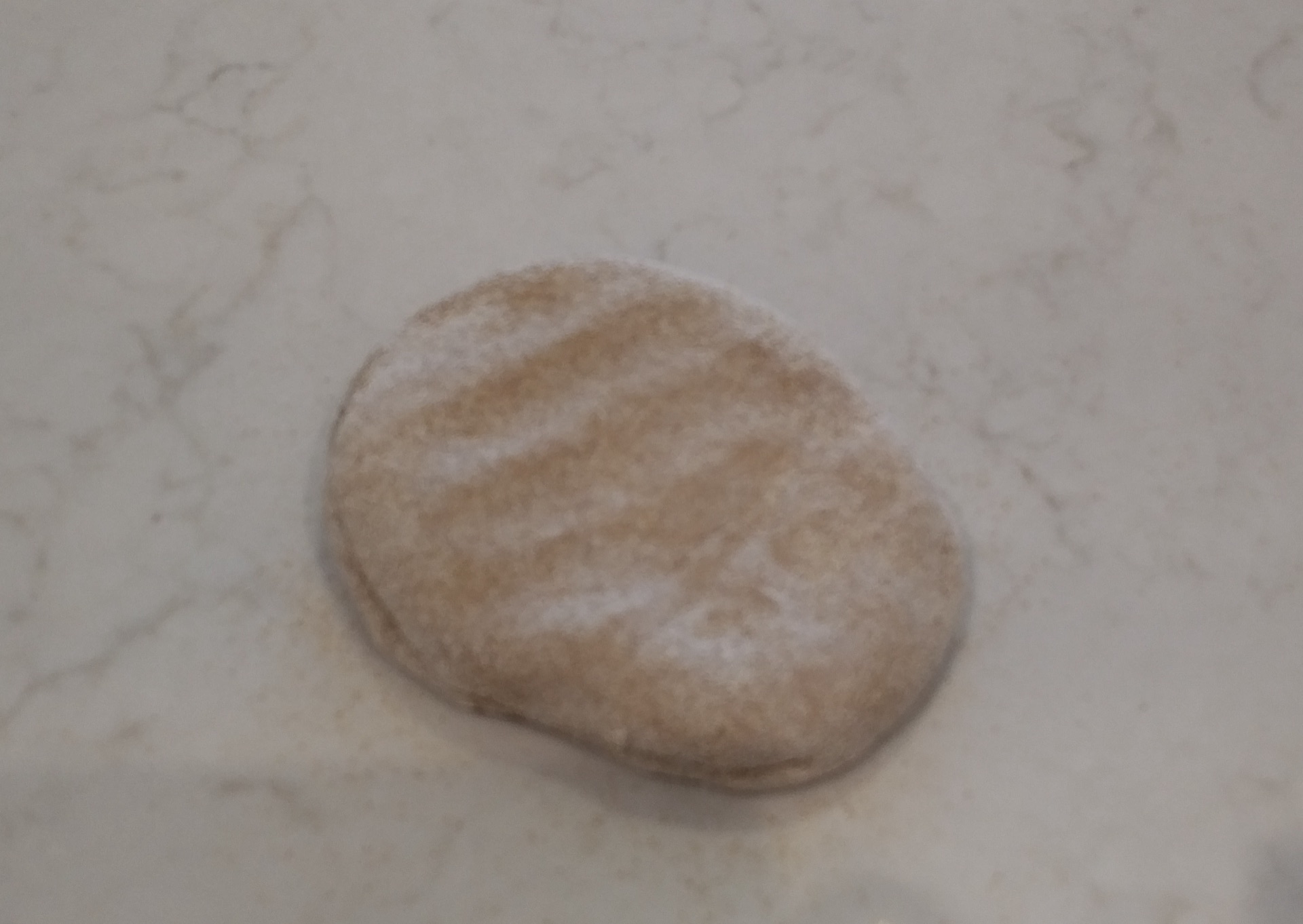 Sixth dough ball floured